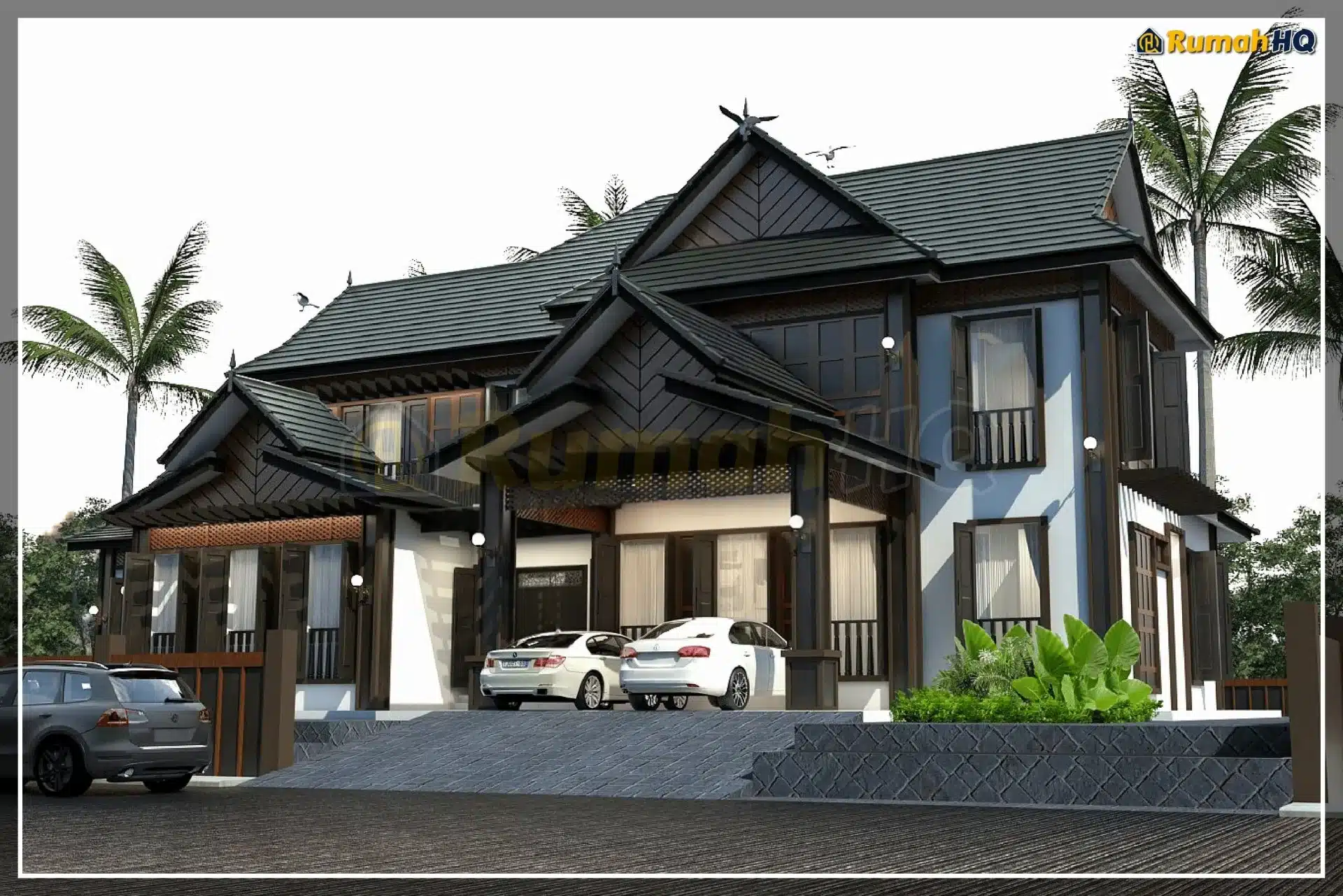Modern two-story house with pitched roof, cars parked outside, surrounded by palm trees and lush greenery.